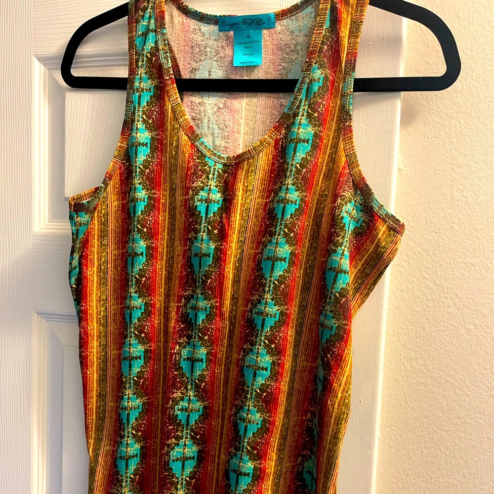 Size M but runs large, never worn but no tags